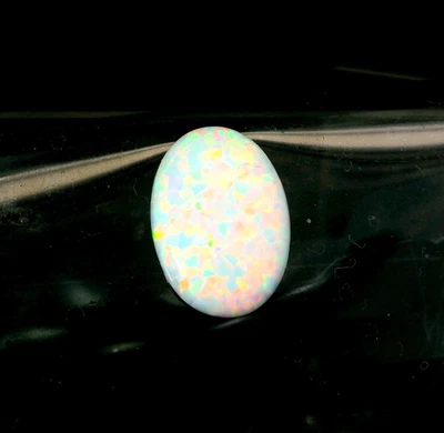 Ópalo multicolor blanco forma ovalada de 3,49 quilates 14 x 10 mm Foto 1 de 4