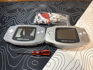 Two Gameboy Advance Shells And Parts ! Silver Has A Good Working Screen ! - Picture 1 of 2