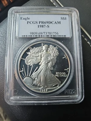 🔥🔥🔥🔥1987 S PR69DCAM American Proof Silver Eagle .999 PCGS 🇺🇲🇺🇲🇺🇲🇺🇲 - Image 1 of 2