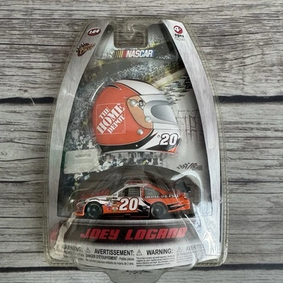 2010 Joey Logano #20 Home Depot NASCAR Winners Circle 1/64 Diecast Jacket Magnet - Image 1 of 4