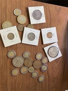 23 monedas de México: 1962 plata un peso, 1976 UNC cinco pesos, 1976 UNC 10 pesos - Imagen 1 de 8