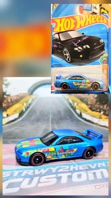 Nissan Skyline Custom Autism Awareness de Hot Wheels con Spectraflame y pilotos reales Foto 1 de 3