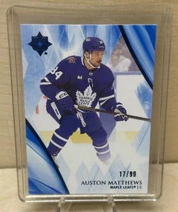 2023-24 Ultimate Collection Auston Matthews #22 azul/99 hojas de arce - Imagen 1 de 2