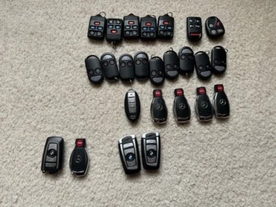 LOTE DE 25 llaves inteligentes usadas OEM BMW M. BENZ FORD HONDA, Nissan Mercury Infiniti. Foto 1 de 4