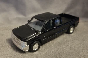 Chevy Silverado Z71 cabina extendida enganche 1999 negro diecast RACING CHAMPIONS 1/64 - Imagen 1 de 7