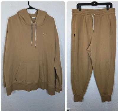 Conjunto de sudadera con capucha y pantalones deportivos Puma infundidos de gran tamaño tostado talla grande Foto 1 de 4