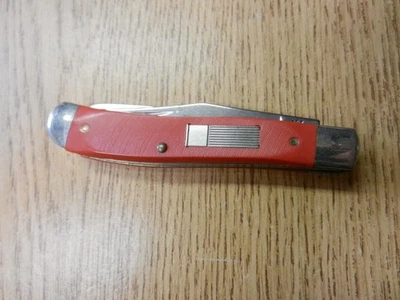 Navaja de Bolsillo Remington USA Sure Shot 2 Hojas Trapper con Asas de Plástico Rojo Usada Foto 1 de 4