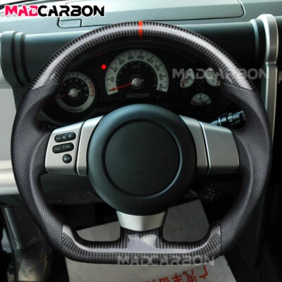 Volante de fibra de carbono real cuero perforado apto 07-14 Toyota FJ Cruiser Foto 1 de 4