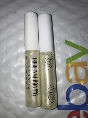 Lote de 2 tubos KARDASHIAN BEAUTY Nos vemos en lentejuelas brillo de labios 350 CRISTAL sin caja Foto 1 de 3