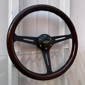 14" Black Steering Wheel With Dark Wood Grip and Chevy Horn Button - 6 Hole - Picture 1 of 5
