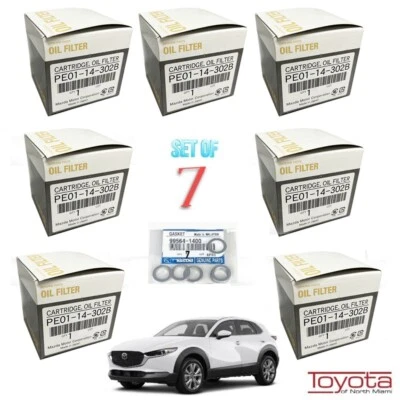 7 juntas de tapón de drenaje de filtros de aceite originales Mazda PE01-14-302A/302B 99564-1400 Foto 1 de 4