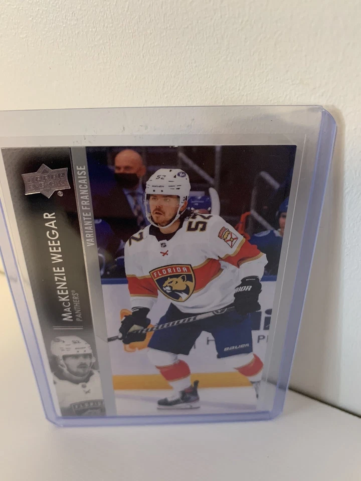 2021-22 Upper Deck Series 1 French Variation MacKenzie Weegar #80  - Image 1 of 2