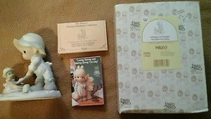 Precious Moments Girl Figurine "Nothing Can Dampen the Spirit of Caring"#603864 - Picture 1 of 5