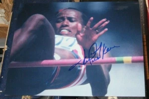 Jackie Joyner-Kersee Olympic Gold Medal High SIGNED AUTOGRAPHED 8x10 Photo COA - Picture 1 of 1