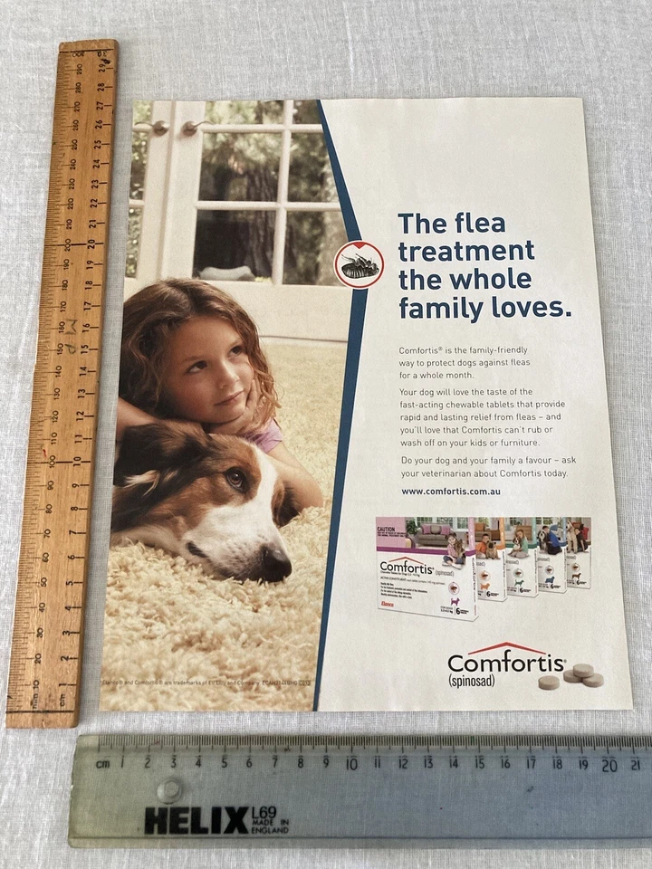 Anuncio impreso en revista ~ 1 página Comfortis Spinosad pulgas perro arte decoración Australia 2011 Foto 1 de 1