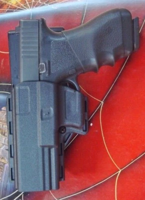 Funda de cinturón Uncle Mike's LH IRT Reflex Competition DO Glock 17 19 22 23 # 74219 Foto 1 de 4