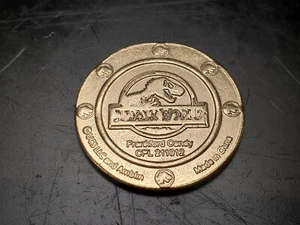 FRANKFORD JURASSIC PARK/WORLD ~ RARE ~ GOLD TONE COIN ~ HARD TO FIND! - Picture 1 of 12