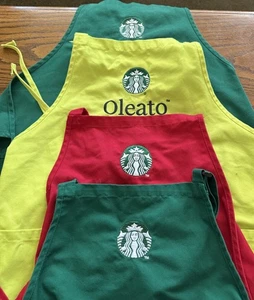4 Stück. Starbucks Logo Barista Schürzen. 2 grüne, 1 rote & 1 Oleato gelbgrün. - Bild 1 von 9