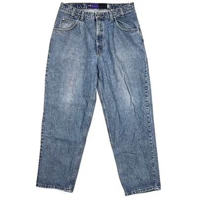 Pantalones de mezclilla vintage Levis con lengüeta plateada para hombre 38x32 etiqueta púrpura azul holgados hechos en EE. UU. Foto 1 de 4
