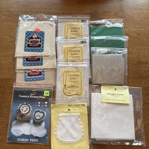 12 Cross Stitch Fabric Bib Keeper Skirt Unopened Varying Sizes Color Count NOS - Picture 1 of 15