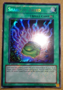 YUGIOH Secret Rare Shard Of Greed PHSW-EN057 1st Edition - Picture 1 of 1