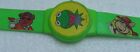 Vintage Kolekcjonerski zegarek zabawka na nadgarstek cyfrowa 7" zielona dzieci krawężnik przód Henso