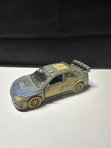 Subaru Impreza WRC 2007 Muddy - Kinsmart Pull Back & Go Metal Model Car - Picture 1 of 8