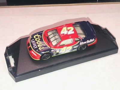 Pontiac Kyle Petty 1996 Coors Light, Action Premium con estuche sin caja 1/64 Foto 1 de 2