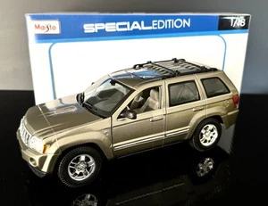 2005 Jeep Grand Cherokee Gold 1/18 Maisto - Picture 1 of 14