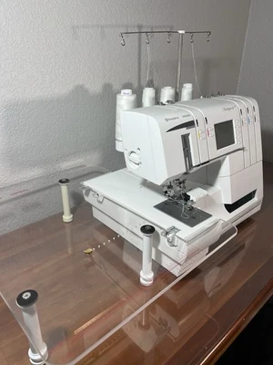Husqvarna Viking Huskylock S25 Serger With plexiglass Extension Table - Image 1 of 4