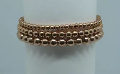 Pulseras apilables rellenas de oro rosa de 14 k de 3, 4 y 5 mm de 6,5" de largo Foto 1 de 3