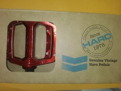 Peddles de Haro. Fusión 9/16. aluminio rojo y llave de pedal Foto 1 de 4