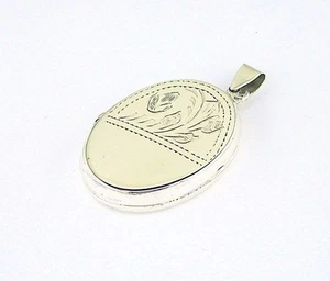 Flat Oval Floral Engraved Locket Pendant Sterling Silver - Picture 1 of 1