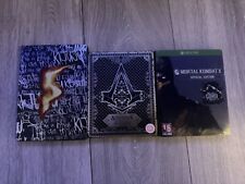 Konvolut von 3 Steelbooks Resident Evil 5 Mortal Kombat X Assassins CreedSyndicate