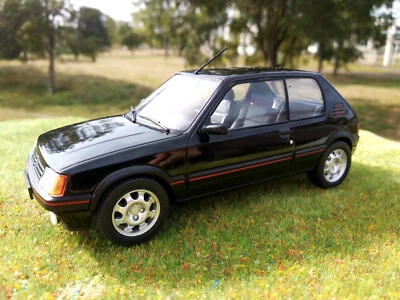 Peugeot 205 GTI 1.9 noire , echelle 1:24,longueur 15cm,neuve, en métal - Photo 1/4