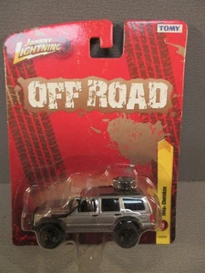 Johnny Lightning Off Road Jeep Cherokee Silver with Snorkel and Spare - Picture 1 of 1
