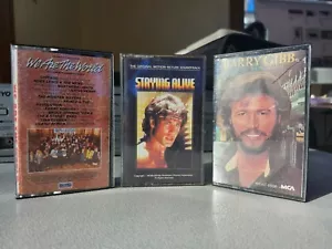 BARRY GIBB NOW VOYAGER WE ARE THE WORLD BEE GEES STAYING ALIVE CASSETTE TAPES - Picture 1 of 2