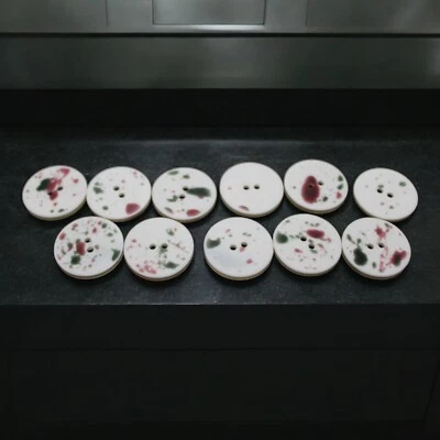 Vintage Plastic 2-hole Round Buttons 13 Count 25.87mm Maroon Green Splatter - Image 1 of 4