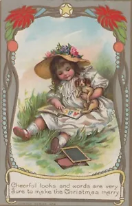 Weihnachten - Mädchen hält Welpen Lesebuch - gebraucht/unbespielt - Bild 1 von 2