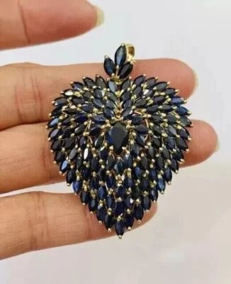 Colgante de zafiro azul creado en laboratorio de corte marquesa de 3 quilates enchapado en oro amarillo de 14 quilates en plata Foto 1 de 4