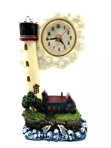 Reloj de trabajo faro vintage de cerámica de 11", casa y delfines usado - Imagen 1 de 5