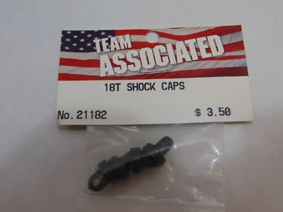 VINTAGE TEAM ASSOCIATED 21182 SHOCK CAPS FOR THE 18T TRUCK - Image 1 of 2