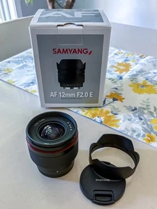 AF Samyang 12mm f/2.0 AF Ultra Wide Lens for Sony E-Mount w/ Box, Hood and Case - Picture 1 of 13