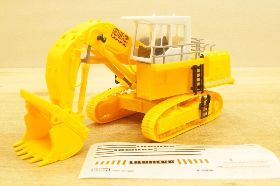 Ho 1:87 Kibri 10638 LIEBHERR R 992 Litronic Con Benna A Fessura Modello Pronto - Immagine 1 di 4