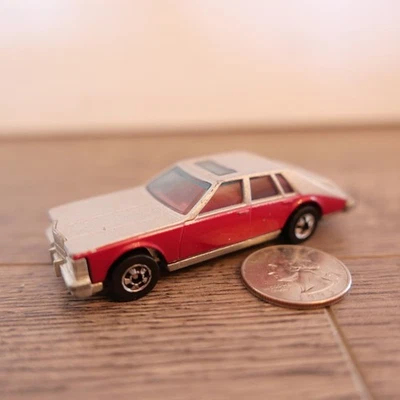 Cadillac Seville Hong Kong Hot Wheels 1982 vintage 1:64 plateado/púrpura Foto 1 de 3