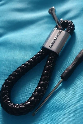 Porte clé AMG porte clé neuf sous blister cuir corde tresser - Photo 1/2