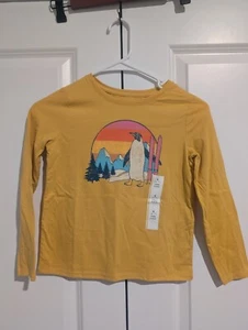 NWT Girls Cat & Jack S (6/7) Mustard Yellow Long Sleeve Shirt Skiing Penguin - Picture 1 of 4