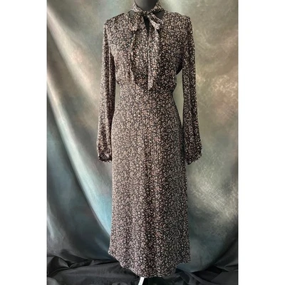 Vestido midi para mujer Warehouse negro estampado floral cuello atado manga larga Foto 1 de 4