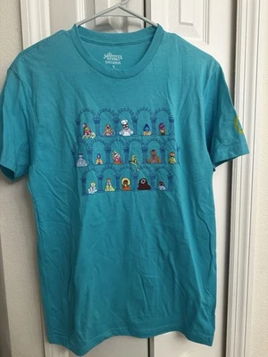 Camisa Destination D23 Muppets 2025 pequeña en mano Foto 1 de 4