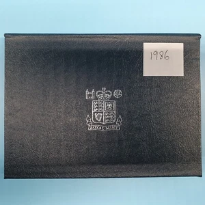 The Royal Mint - 1986 Proof 8 Coin Set In A Blue Case Complete With COA - Picture 1 of 3